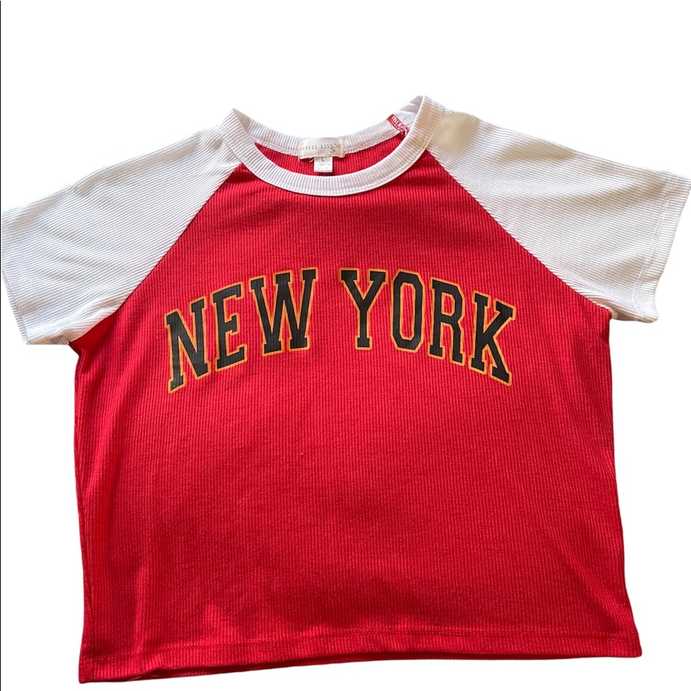 Crop top with red and white and has New York on front